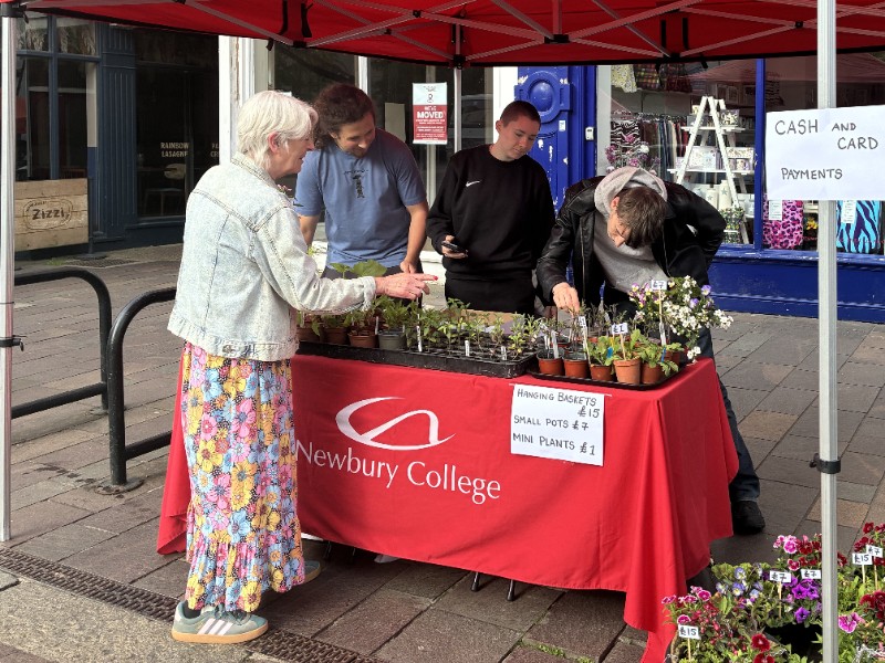 Uniformed Public Services students develop key community skills volunteering on the market stall