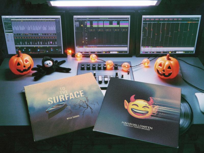 Album artwork on a mixing desk